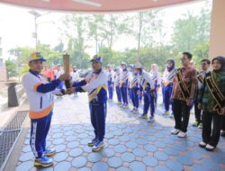 Penyerahan Api Obor, Pj Walikota Tangerang  Kobarkan Semangat untuk Raih yang Terbaik di POPDA XI